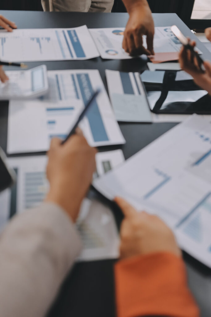 business team analyzing financial data in modern office
